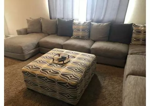 Large sectional couch with matching ottoman, excellent condition!